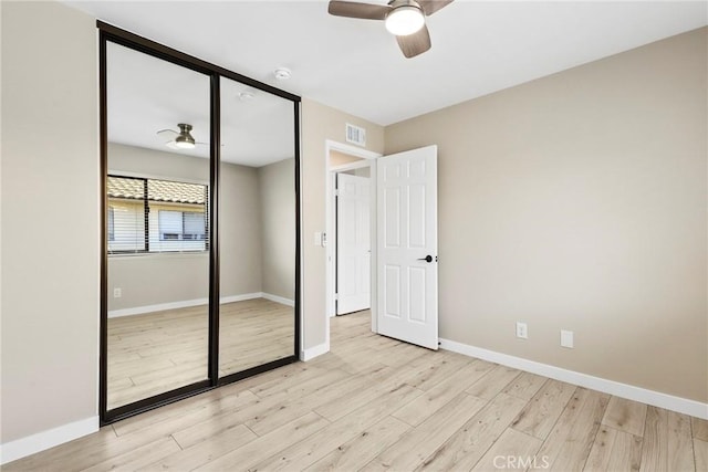 26322 W Bravo Ln, Calabasas, CA 91302 - unfurnished bedroom with wood finished floors, a closet, baseboards, and ceiling fan
