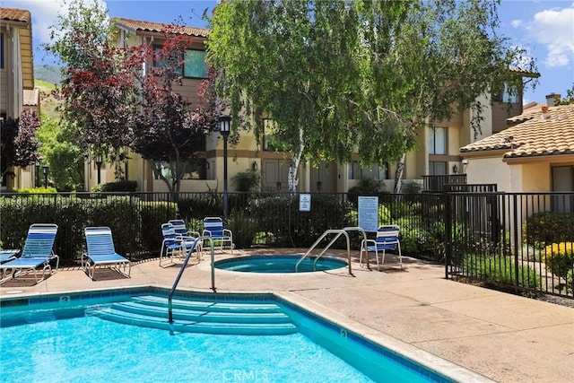 26322 W Bravo Ln, Calabasas, CA 91302 - community pool featuring a hot tub and a patio