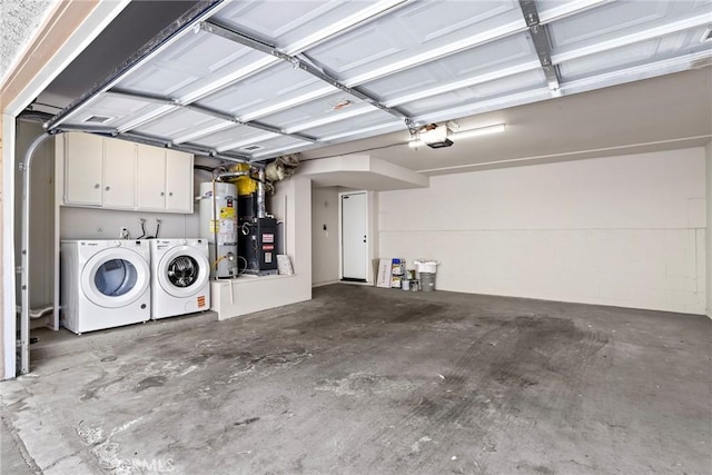 26322 W Bravo Ln, Calabasas, CA 91302 - garage featuring washer and clothes dryer and strapped water heater