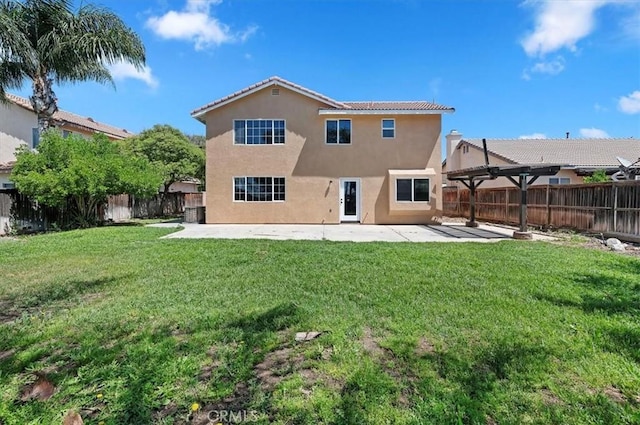 27541 Vanilla Ct, Menifee, CA 92585 - back of property featuring stucco siding, a patio area, and a tile roof