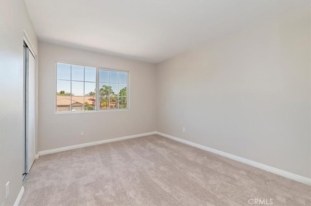 27541 Vanilla Ct, Menifee, CA 92585 - empty room featuring light colored carpet and baseboards