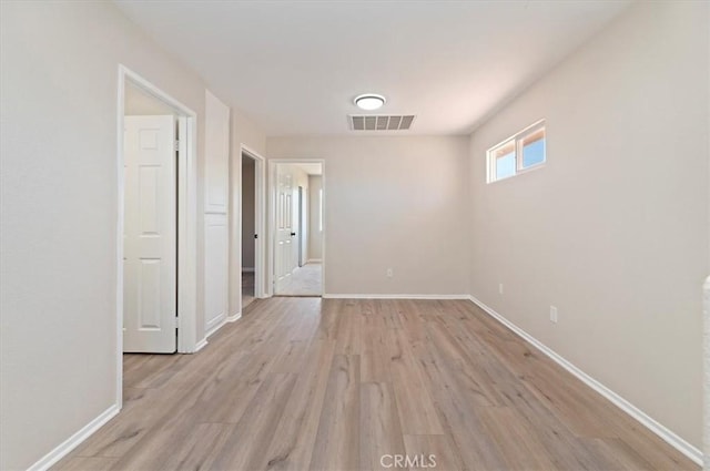 27541 Vanilla Ct, Menifee, CA 92585 - spare room featuring light wood-type flooring and baseboards