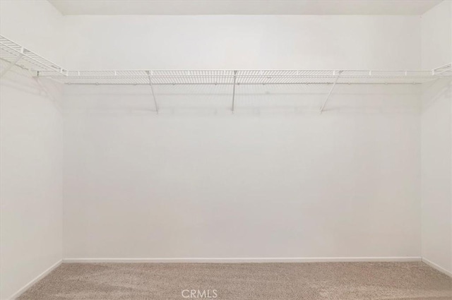 27541 Vanilla Ct, Menifee, CA 92585 - spacious closet featuring light colored carpet