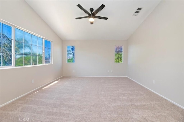 27541 Vanilla Ct, Menifee, CA 92585 - empty room with lofted ceiling, a ceiling fan, plenty of natural light, and carpet floors