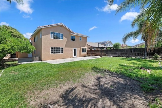 27541 Vanilla Ct, Menifee, CA 92585 - rear view of house featuring stucco siding and a patio area