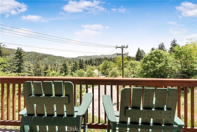 2340 Deep Creek Dr, Running Springs, CA 92382 - deck featuring a view of trees