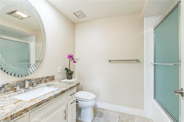 879 Via Mendoza Unit B, Laguna Woods, CA 92637 - full bath featuring vanity, shower / bath combination with glass door, and tile patterned flooring