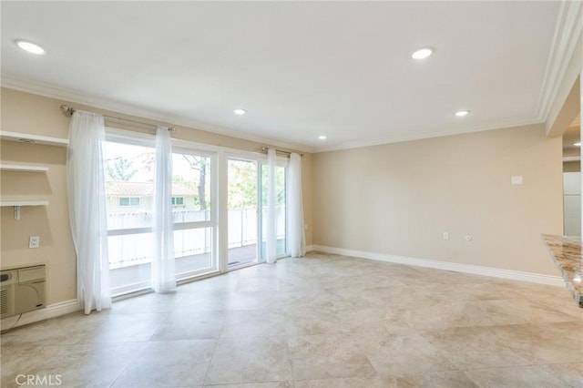879 Via Mendoza Unit B, Laguna Woods, CA 92637 - unfurnished living room with ornamental molding and recessed lighting
