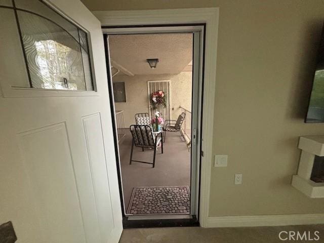 879 Via Mendoza Unit B, Laguna Woods, CA 92637 - hallway with carpet