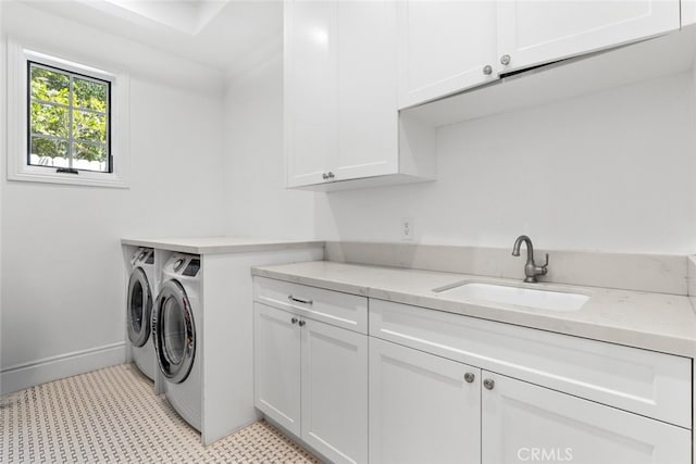3914 Woodfield Dr, Sherman Oaks, CA 91403 - laundry area with cabinet space, separate washer and dryer, and baseboards