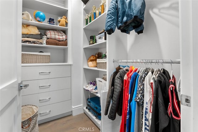 3914 Woodfield Dr, Sherman Oaks, CA 91403 - spacious closet featuring wood finished floors