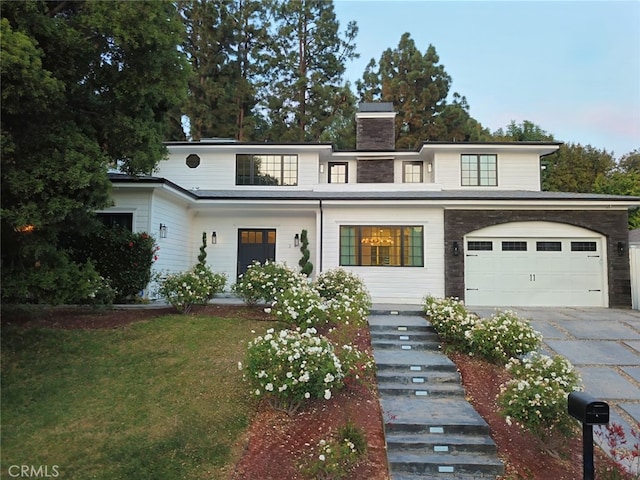 3914 Woodfield Dr, Sherman Oaks, CA 91403 - view of front of property featuring concrete driveway, a chimney, a garage, and a front lawn