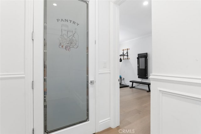 3914 Woodfield Dr, Sherman Oaks, CA 91403 - hallway with recessed lighting, light wood-style flooring, and crown molding