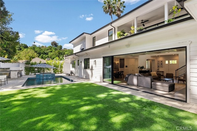3914 Woodfield Dr, Sherman Oaks, CA 91403 - rear view of property with a patio, an outdoor kitchen, and outdoor lounge area