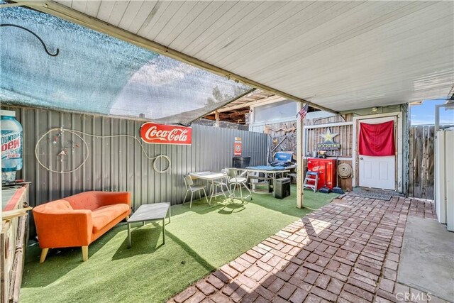 26447 20 Mule Team Rd, Boron, CA 93516 - fenced backyard with a patio area