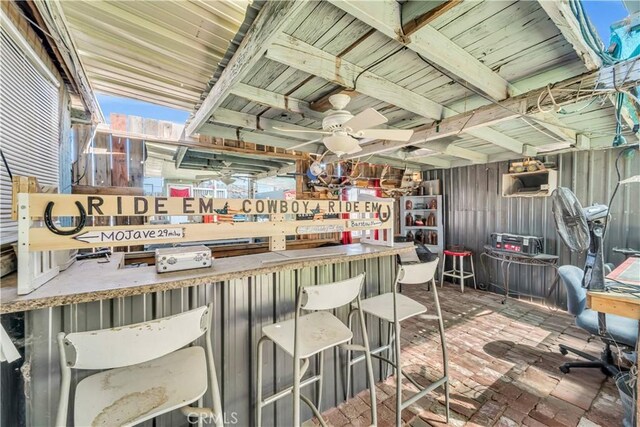 26447 20 Mule Team Rd, Boron, CA 93516 - bar area with brick flooring and a ceiling fan