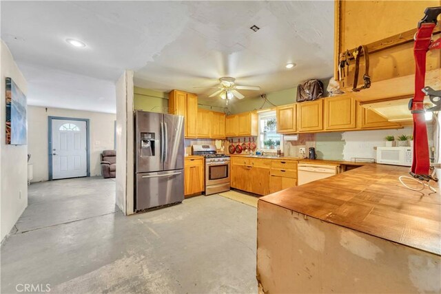 26447 20 Mule Team Rd, Boron, CA 93516 - kitchen with stainless steel appliances, ceiling fan, concrete floors, recessed lighting, and butcher block countertops