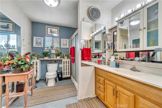 26447 20 Mule Team Rd, Boron, CA 93516 - bathroom with vanity, concrete flooring, and toilet