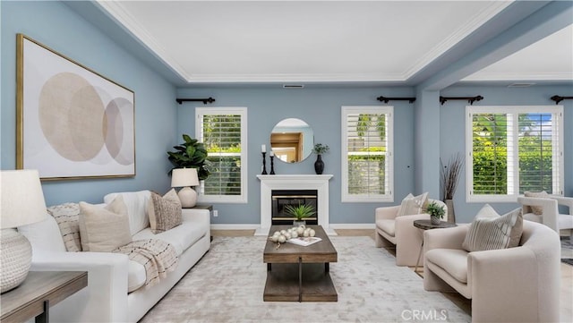 2225 Wind River Ln, Rowland Heights, CA 91748 - living area featuring crown molding, a glass covered fireplace, baseboards, and a raised ceiling