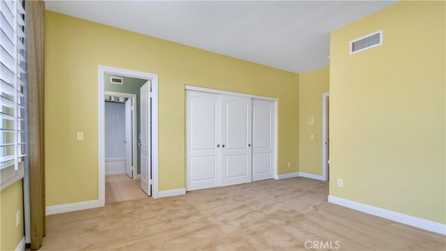 2225 Wind River Ln, Rowland Heights, CA 91748 - unfurnished bedroom with ensuite bath, light carpet, a closet, and baseboards
