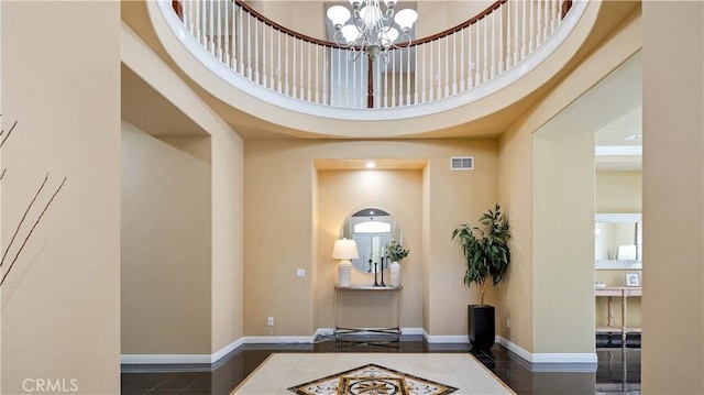 2225 Wind River Ln, Rowland Heights, CA 91748 - entryway with a chandelier, tile patterned flooring, baseboards, and a high ceiling