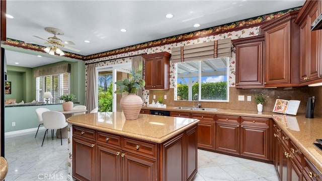 2225 Wind River Ln, Rowland Heights, CA 91748 - kitchen with a sink, a ceiling fan, tasteful backsplash, light stone counters, and recessed lighting