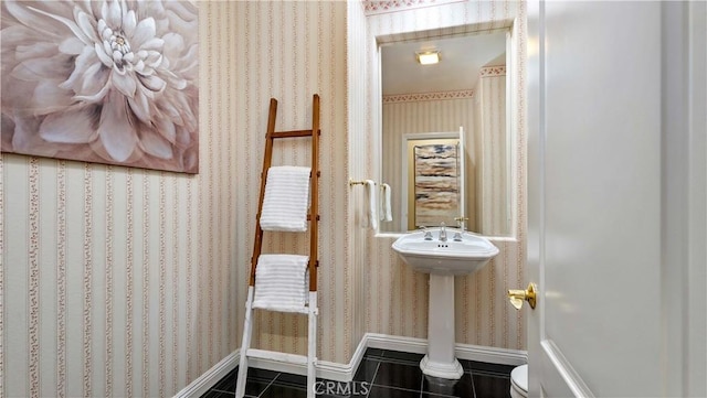 2225 Wind River Ln, Rowland Heights, CA 91748 - half bath with tile patterned floors, wallpapered walls, toilet, and baseboards