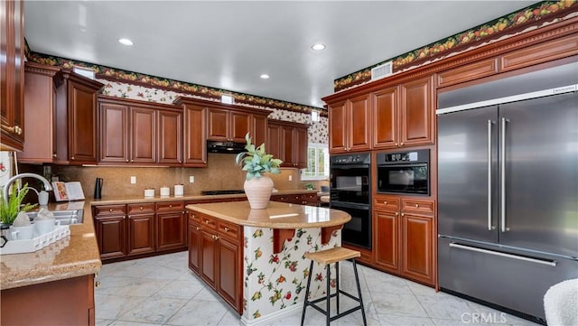 2225 Wind River Ln, Rowland Heights, CA 91748 - kitchen featuring high end refrigerator, a sink, backsplash, recessed lighting, and light stone counters