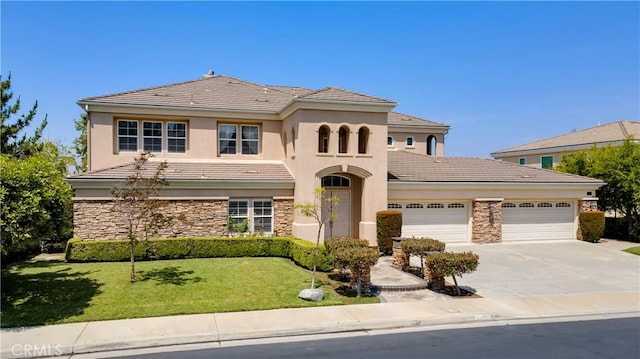 2225 Wind River Ln, Rowland Heights, CA 91748 - view of front of home featuring stone siding, a garage, a front yard, concrete driveway, and stucco siding