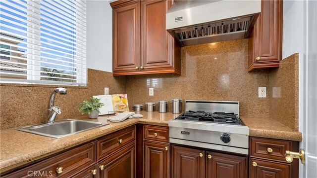2225 Wind River Ln, Rowland Heights, CA 91748 - kitchen featuring custom range hood, stainless steel gas stovetop, a sink, light countertops, and decorative backsplash