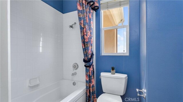 2225 Wind River Ln, Rowland Heights, CA 91748 - bathroom featuring shower / bath combo with shower curtain and toilet
