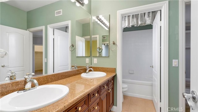 2225 Wind River Ln, Rowland Heights, CA 91748 - full bath featuring double vanity, toilet, tile patterned floors, and bathtub / shower combination