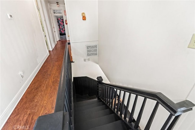 256 E 1st Ave, Chico, CA 95926 - staircase with wood finished floors and baseboards