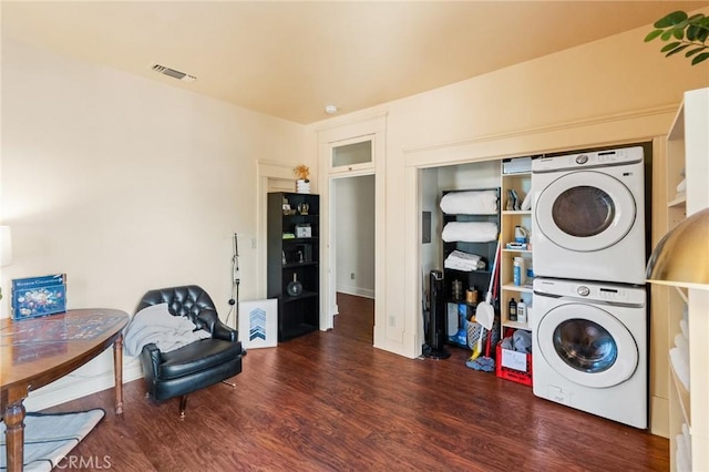 256 E 1st Ave, Chico, CA 95926 - washroom featuring stacked washer / dryer and wood finished floors