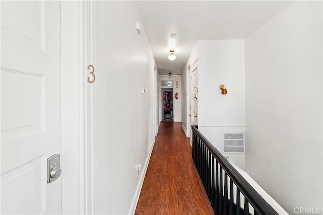 256 E 1st Ave, Chico, CA 95926 - hall featuring dark wood-style floors and baseboards