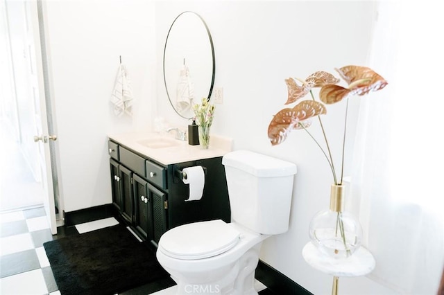 256 E 1st Ave, Chico, CA 95926 - bathroom featuring vanity and toilet