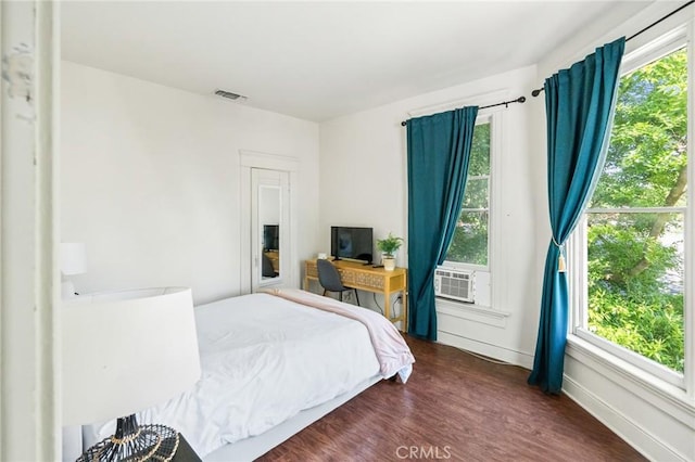 256 E 1st Ave, Chico, CA 95926 - bedroom featuring dark wood-style flooring, cooling unit, and baseboards