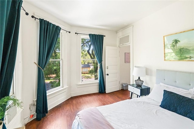 256 E 1st Ave, Chico, CA 95926 - bedroom featuring wood finished floors and baseboards