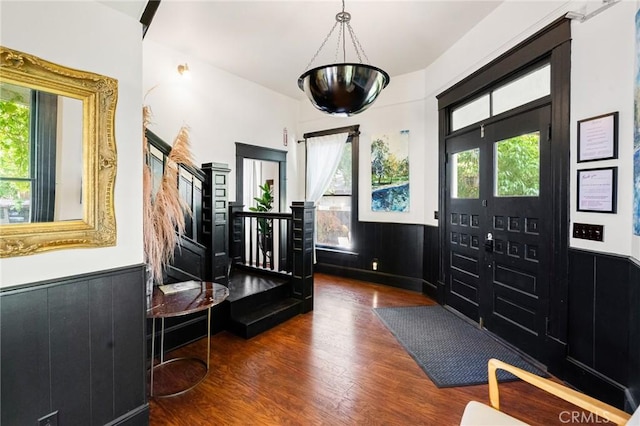 256 E 1st Ave, Chico, CA 95926 - entryway featuring wainscoting, healthy amount of natural light, and wood finished floors