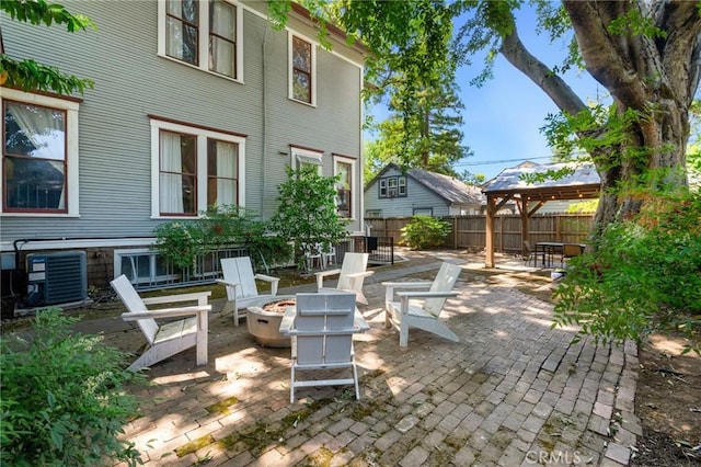 256 E 1st Ave, Chico, CA 95926 - view of patio with a gazebo, cooling unit, and an outdoor fire pit