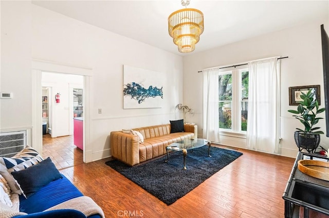 256 E 1st Ave, Chico, CA 95926 - living area featuring a chandelier and wood finished floors