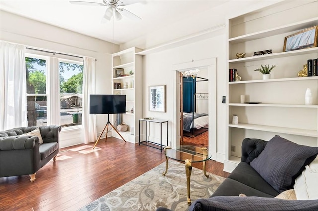 256 E 1st Ave, Chico, CA 95926 - living area featuring wood finished floors, ceiling fan, a chandelier, and built in shelves