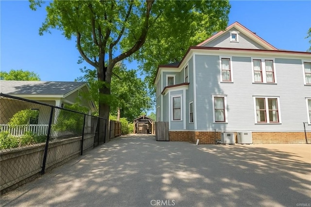 256 E 1st Ave, Chico, CA 95926 - view of property exterior featuring a cooling unit