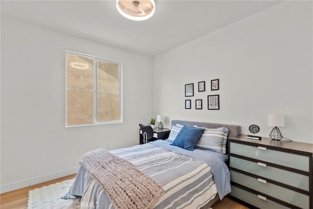 28321 Esplanada Dr, Valencia, CA 91354 - bedroom with wood finished floors and baseboards