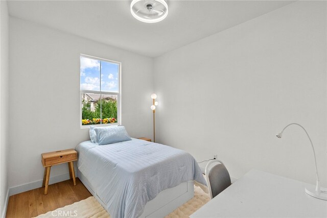 28321 Esplanada Dr, Valencia, CA 91354 - bedroom with wood finished floors and baseboards