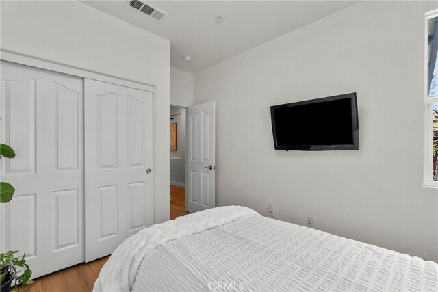 28321 Esplanada Dr, Valencia, CA 91354 - bedroom with wood finished floors and a closet