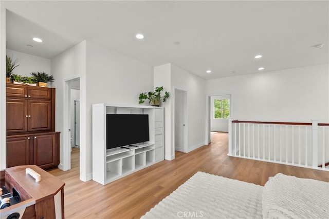 28321 Esplanada Dr, Valencia, CA 91354 - living room featuring light wood finished floors, recessed lighting, and baseboards