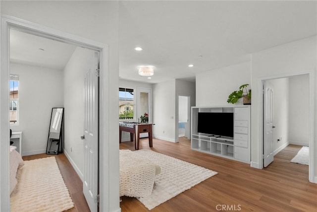 28321 Esplanada Dr, Valencia, CA 91354 - living area with wood finished floors, baseboards, and recessed lighting