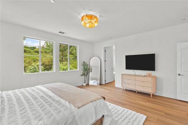 28321 Esplanada Dr, Valencia, CA 91354 - bedroom featuring light wood-style flooring and baseboards