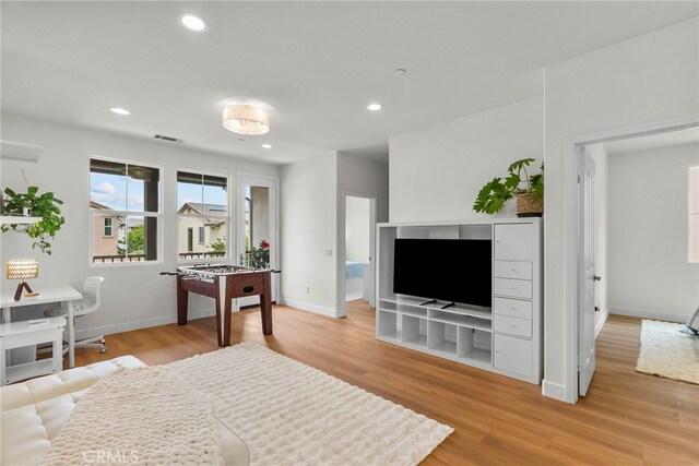 28321 Esplanada Dr, Valencia, CA 91354 - living area with light wood-style flooring, baseboards, and recessed lighting